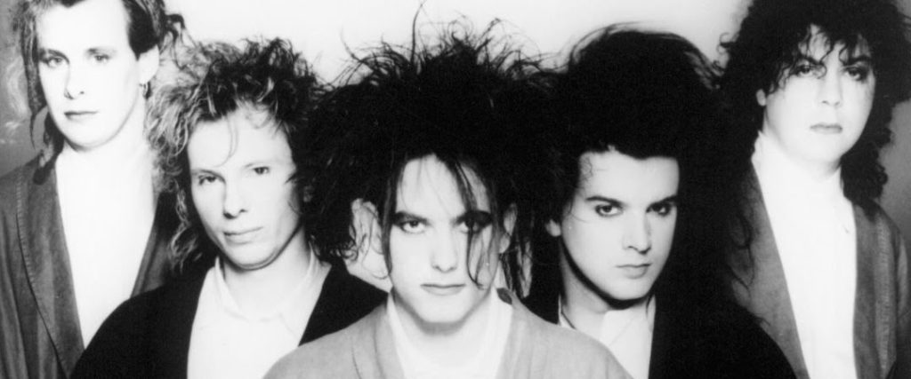 Exploring the Musical Enigma: The Cure – Origins, Evolution, and Everlasting Impact